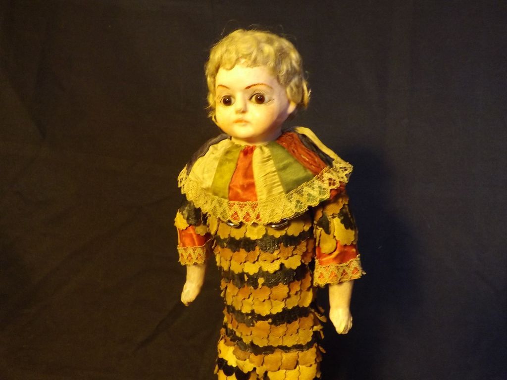 Amazing and RARE glass eyed Paper Mache Clown with incredible hand made outfit. Amazing and RARE glass eyed Paper Mache Clown with incredible hand made outfit.