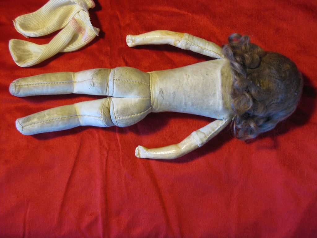 Magnificent 14' glass eyed Paper Mache fashion Bebe with belton style shoulder head. Magnificent 14' glass eyed Paper Mache fashion Bebe with belton style shoulder head.