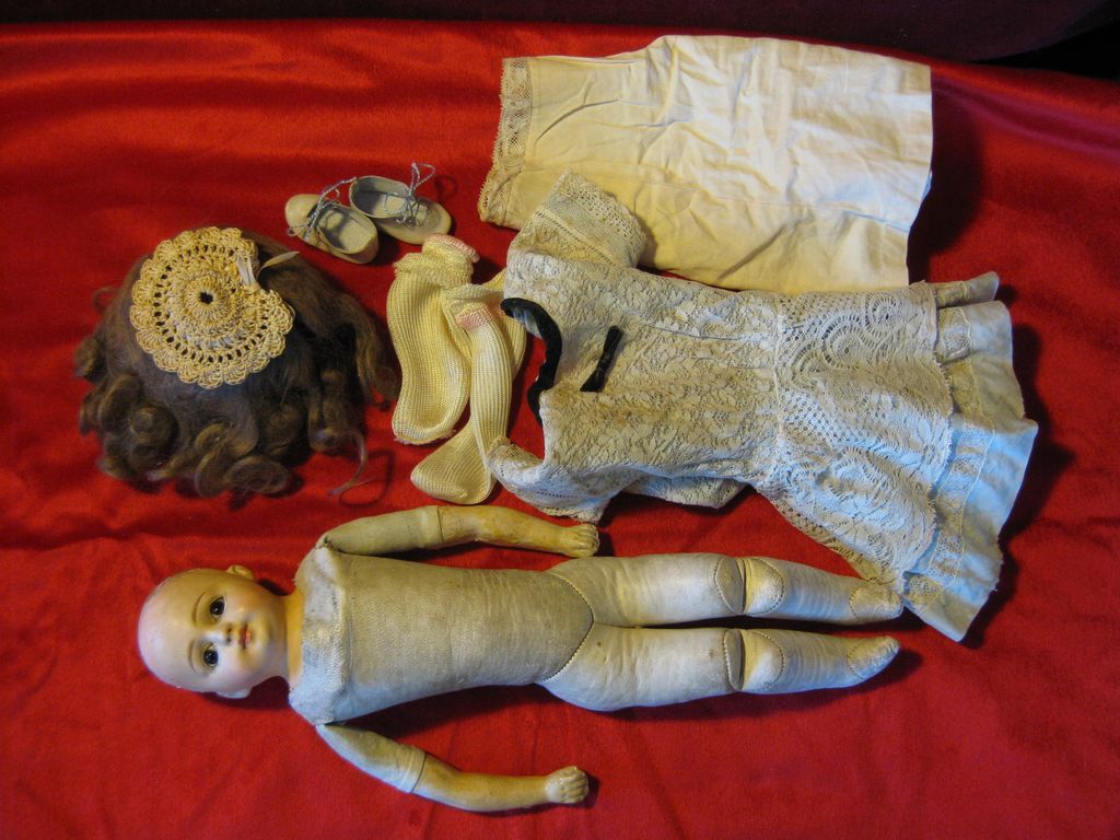 Magnificent 14' glass eyed Paper Mache fashion Bebe with belton style shoulder head. Magnificent 14' glass eyed Paper Mache fashion Bebe with belton style shoulder head.