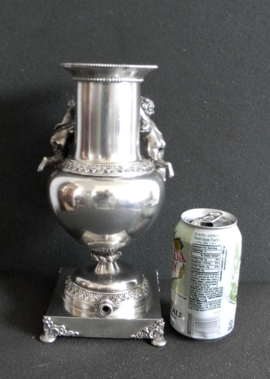 Silver plate vase with cherubs and figure - wind figure Silver plate vase with cherubs and figure - wind figure