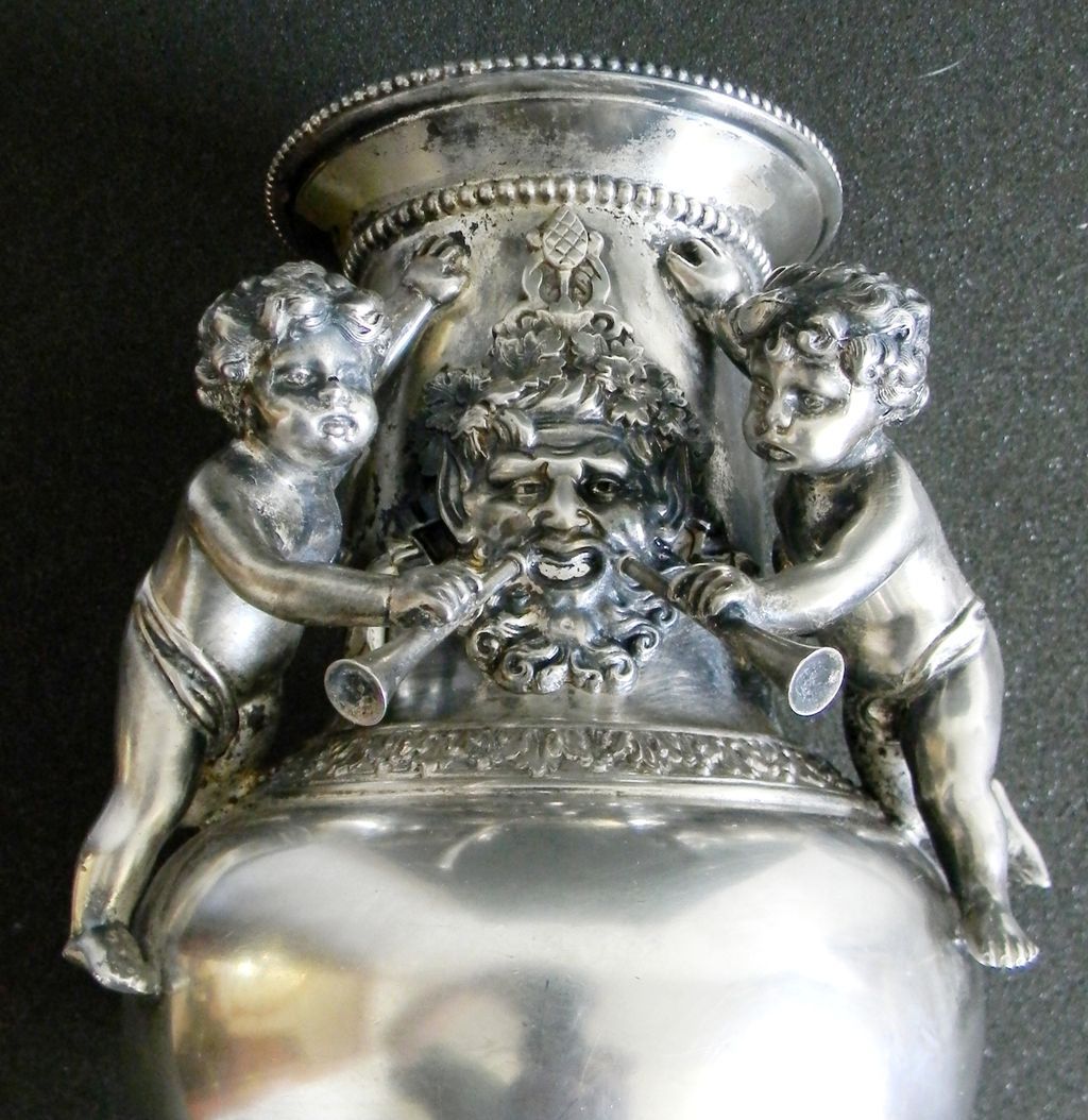 Silver plate vase with cherubs and figure - wind figure Silver plate vase with cherubs and figure - wind figure
