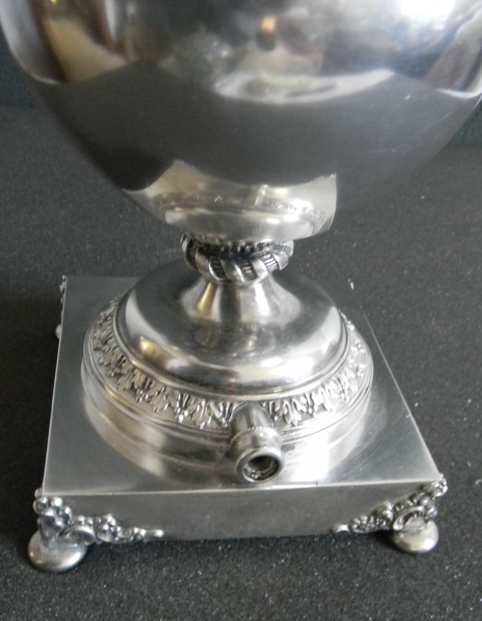 Silver plate vase with cherubs and figure - wind figure Silver plate vase with cherubs and figure - wind figure