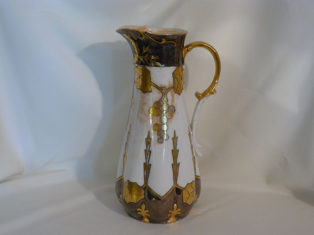 Platinum and gold hand painted Limoges porcelain pitcher Platinum and gold hand painted Limoges porcelain pitcher