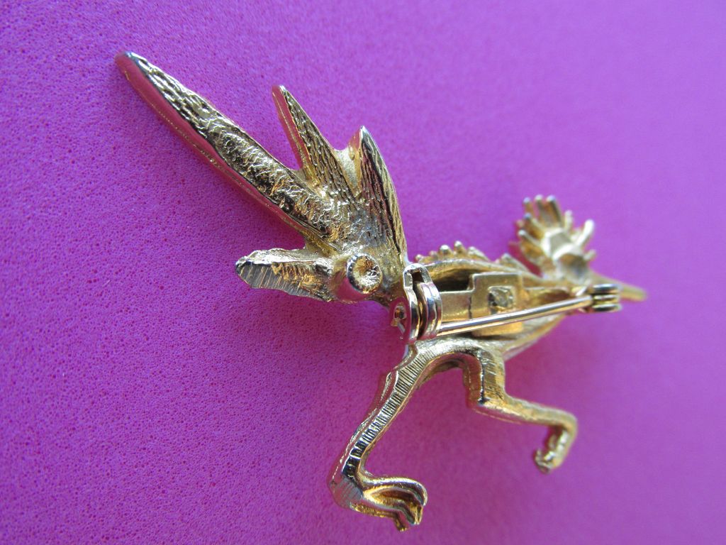 Vintage White Enamel Gold Tone Road Runner Brooch with Ruby Rhinestone Vintage White Enamel Gold Tone Road Runner Brooch with Ruby Rhinestone