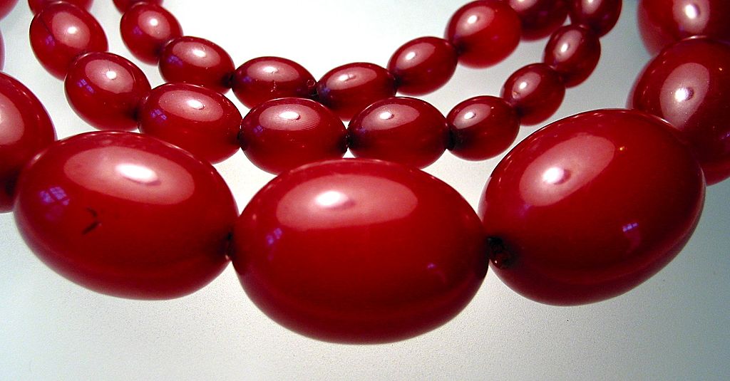 Early Deco Rich Cherry Red Amber Long Bead Necklace from verdegriffin