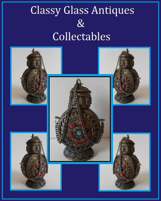 Early 20th Century Oriental Tibetan Silver & Ebonized Wood Temple Pedestal Snuff Bottle Early 20th Century Oriental Tibetan Silver & Ebonized Wood Temple Pedestal Snuff Bottle