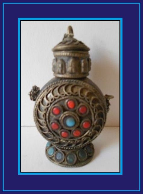 Early 20th Century Oriental Tibetan Silver & Ebonized Wood Temple Pedestal Snuff Bottle Early 20th Century Oriental Tibetan Silver & Ebonized Wood Temple Pedestal Snuff Bottle