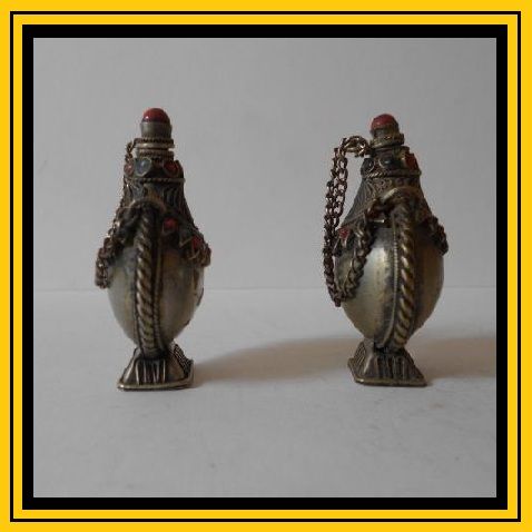 Superb Pair of Antique Tibetan Silver Pedestal Temple Snuff Bottles. Early 20th century Superb Pair of Antique Tibetan Silver Pedestal Temple Snuff Bottles. Early 20th century