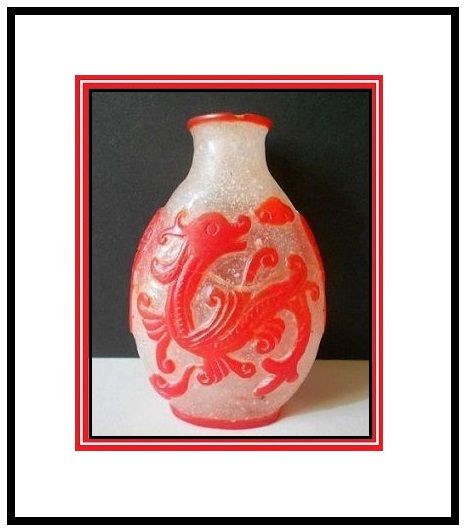 Liu Li Peking Ice Glass Snuff Bottle with Cameo Carved Scarlet Red Dragons Liu Li Peking Ice Glass Snuff Bottle with Cameo Carved Scarlet Red Dragons
