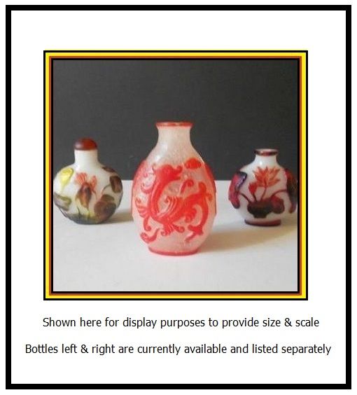 Liu Li Peking Ice Glass Snuff Bottle with Cameo Carved Scarlet Red Dragons Liu Li Peking Ice Glass Snuff Bottle with Cameo Carved Scarlet Red Dragons