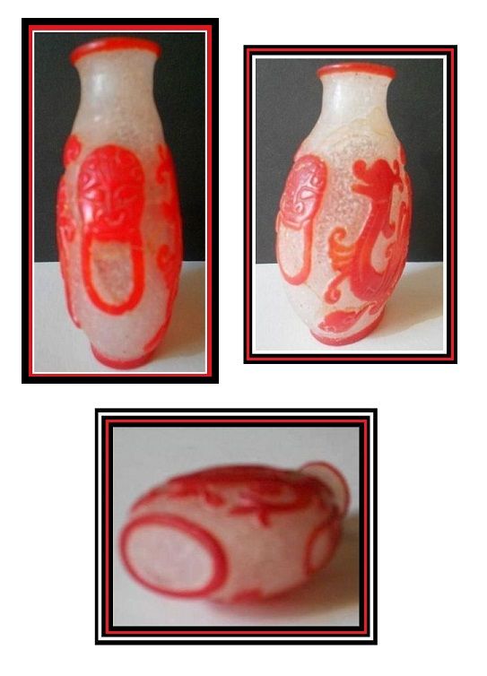 Liu Li Peking Ice Glass Snuff Bottle with Cameo Carved Scarlet Red Dragons Liu Li Peking Ice Glass Snuff Bottle with Cameo Carved Scarlet Red Dragons