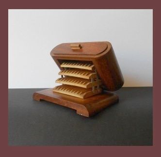 Handsome Handmade English Art Deco Large Wooden Cigar Cigarette Case with four Concealed Internal Shelves. Handsome Handmade English Art Deco Large Wooden Cigar Cigarette Case with four Concealed Internal Shelves.