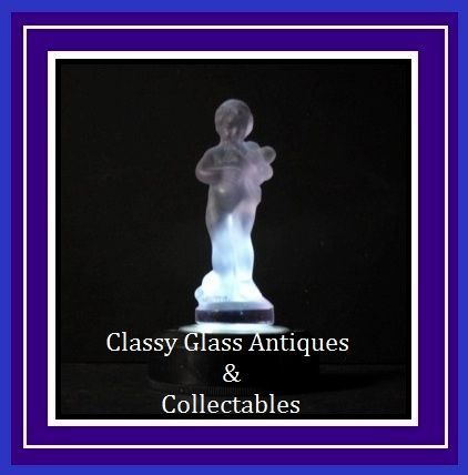 Amethyst - Lavender Crystal Glass Figurine of a Cherub Boy by Sabino circa 1970s Amethyst - Lavender Crystal Glass Figurine of a Cherub Boy by Sabino circa 1970s