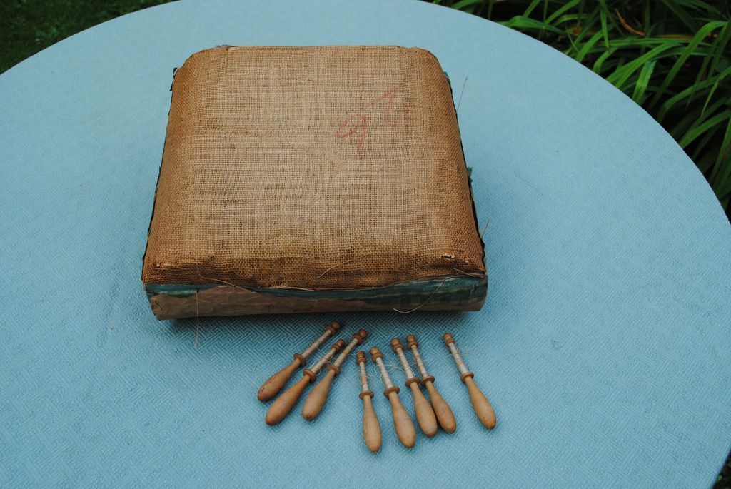 French Lace Making Pillow With Bobbin Lace Still Attached from