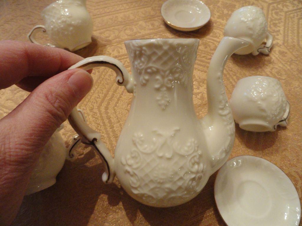 Lovely White Raised Design Trimmed in Gold Doll's Tea Set Lovely White Raised Design Trimmed in Gold Doll's Tea Set