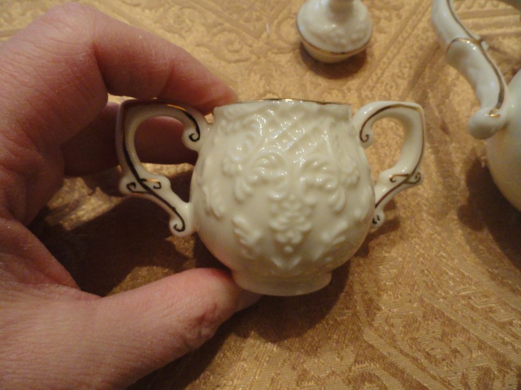 Lovely White Raised Design Trimmed in Gold Doll's Tea Set Lovely White Raised Design Trimmed in Gold Doll's Tea Set