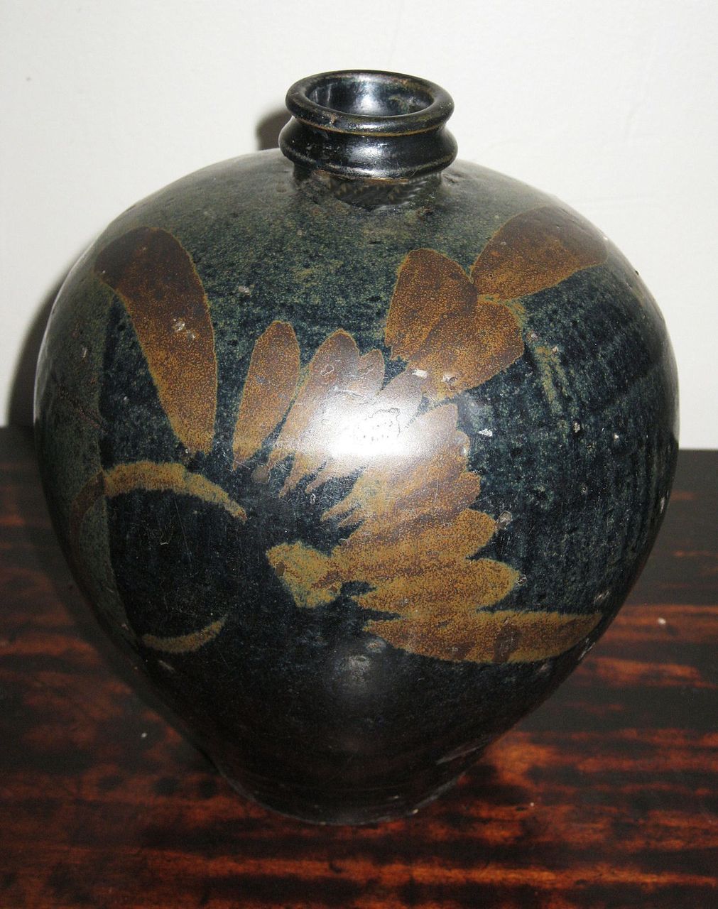Chinese Henan Pottery Black-Glazed Vase with Rust Floral Motif Chinese Henan Pottery Black-Glazed Vase with Rust Floral Motif