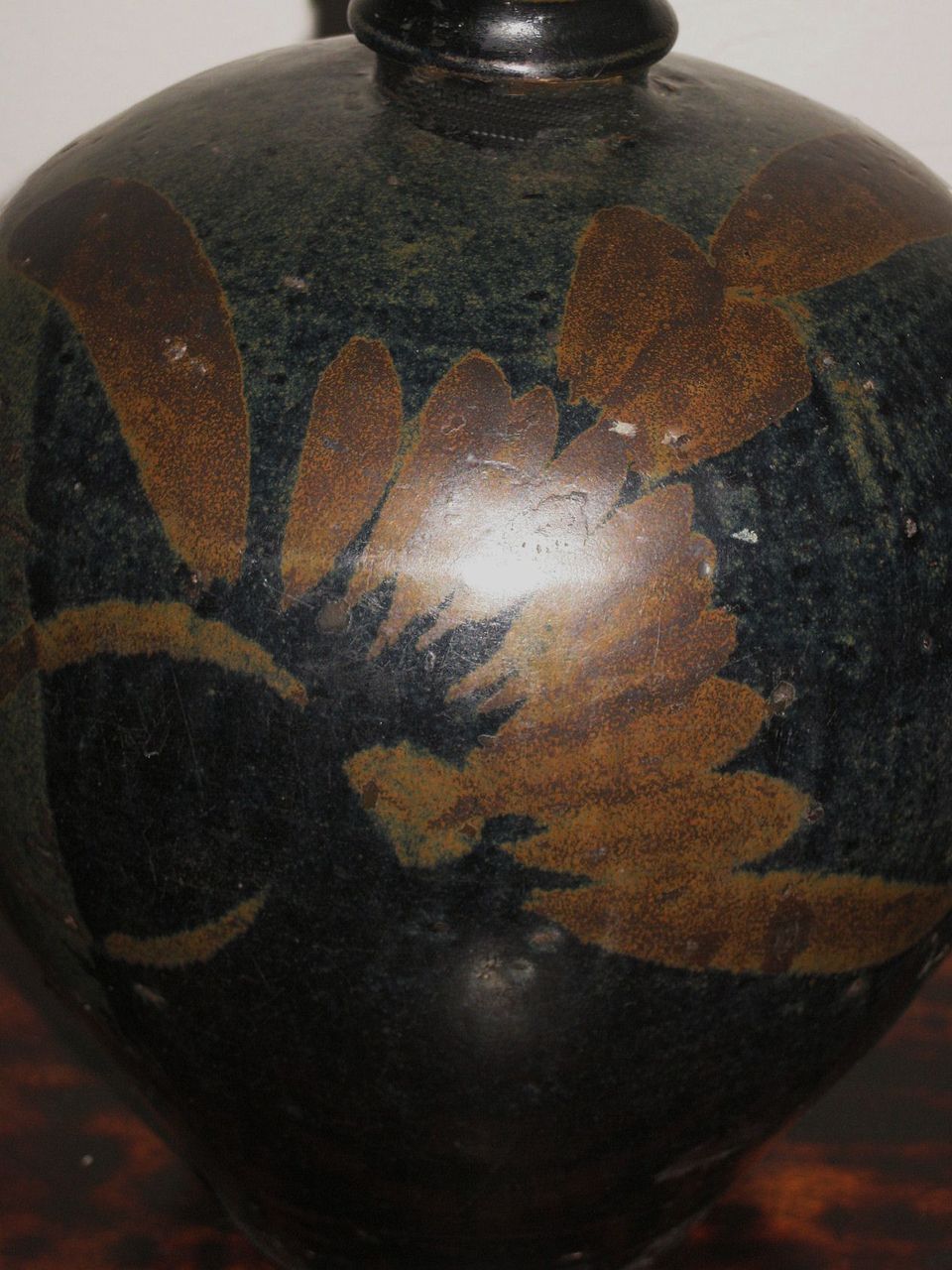 Chinese Henan Pottery Black-Glazed Vase with Rust Floral Motif Chinese Henan Pottery Black-Glazed Vase with Rust Floral Motif