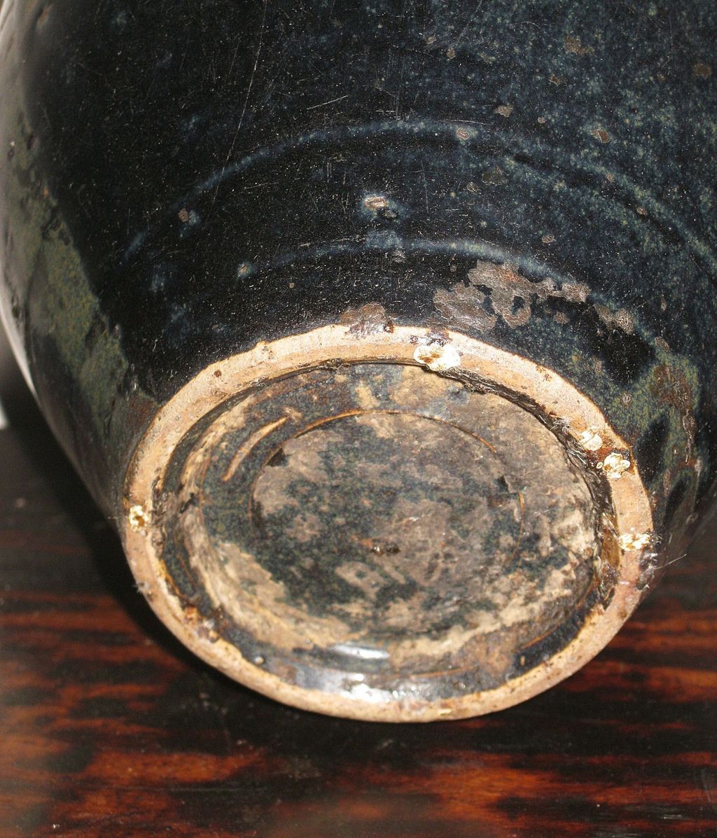 Chinese Henan Pottery Black-Glazed Vase with Rust Floral Motif Chinese Henan Pottery Black-Glazed Vase with Rust Floral Motif
