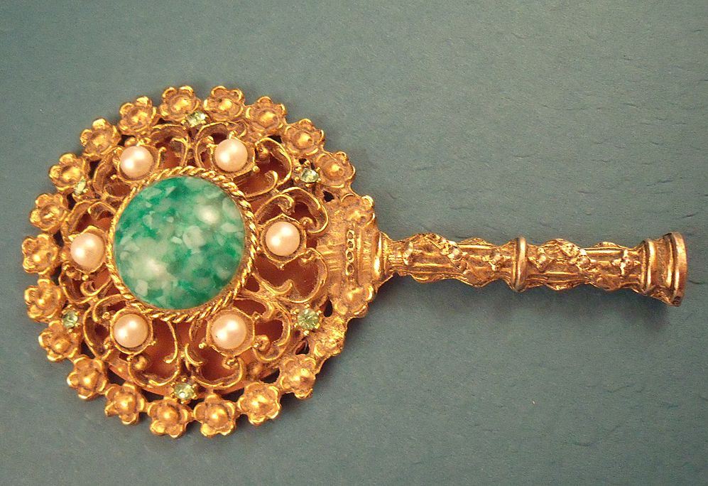 ornate hand mirror