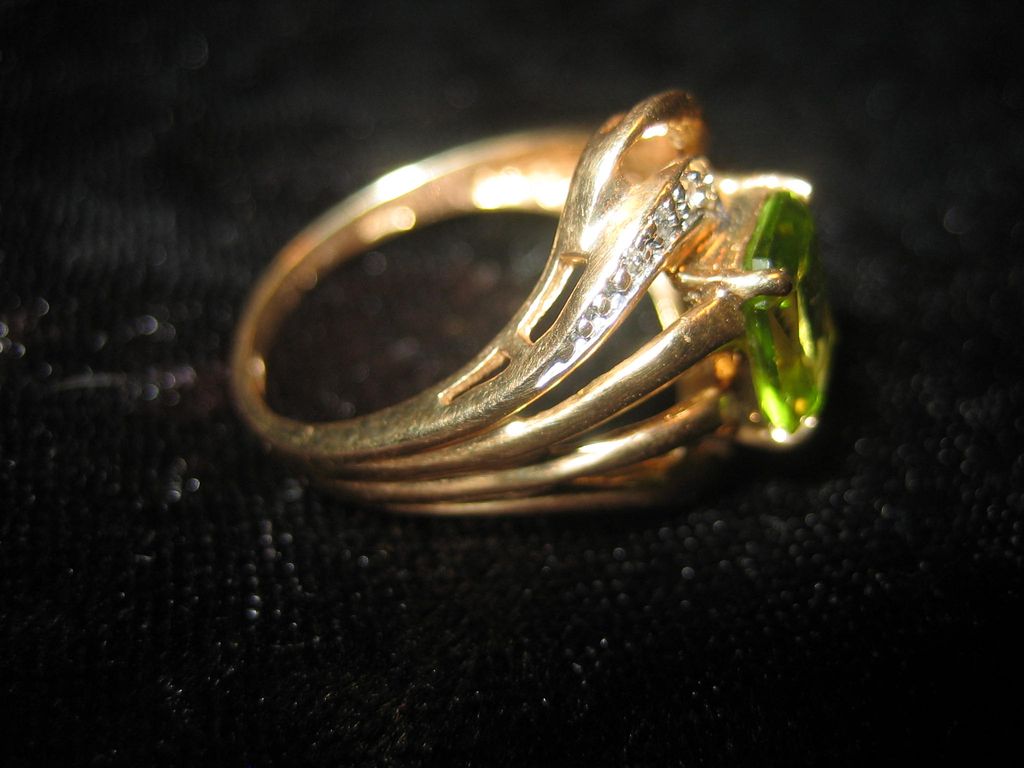 Peridot & Diamond Ring in 14 Karat Gold Peridot & Diamond Ring in 14 Karat Gold