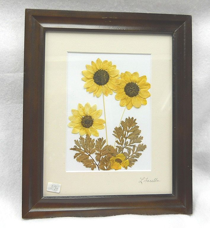 Floral wall decor created with natural pressed botanicals Floral wall decor created with natural pressed botanicals