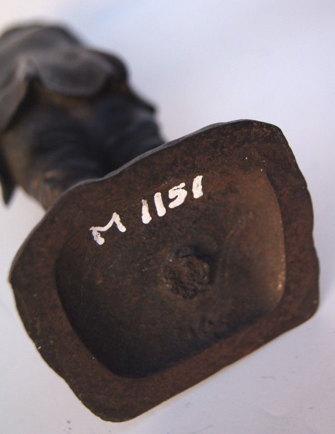 Cast Iron Figure of a Pick Pocket Turn of the Century Cast Iron Figure of a Pick Pocket Turn of the Century