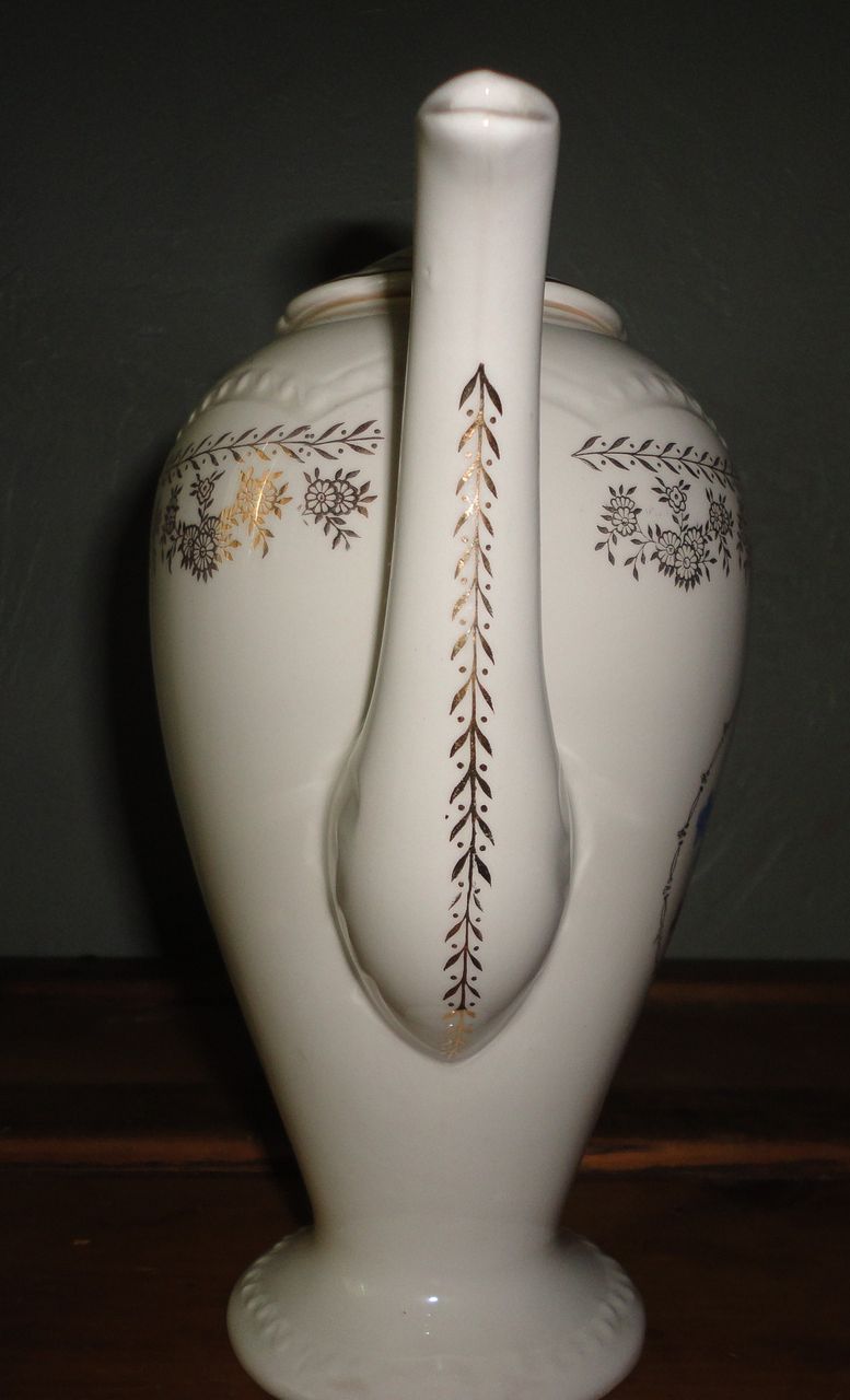 Vintage Tall Porcelain Hand Painted Flower Motive Tea Pot. Vintage Tall Porcelain Hand Painted Flower Motive Tea Pot.