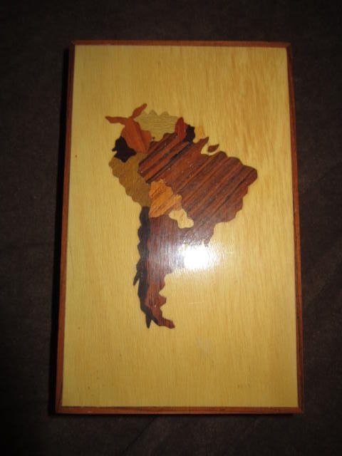 Vintage box with wood inlay of South America on lid Vintage box with wood inlay of South America on lid