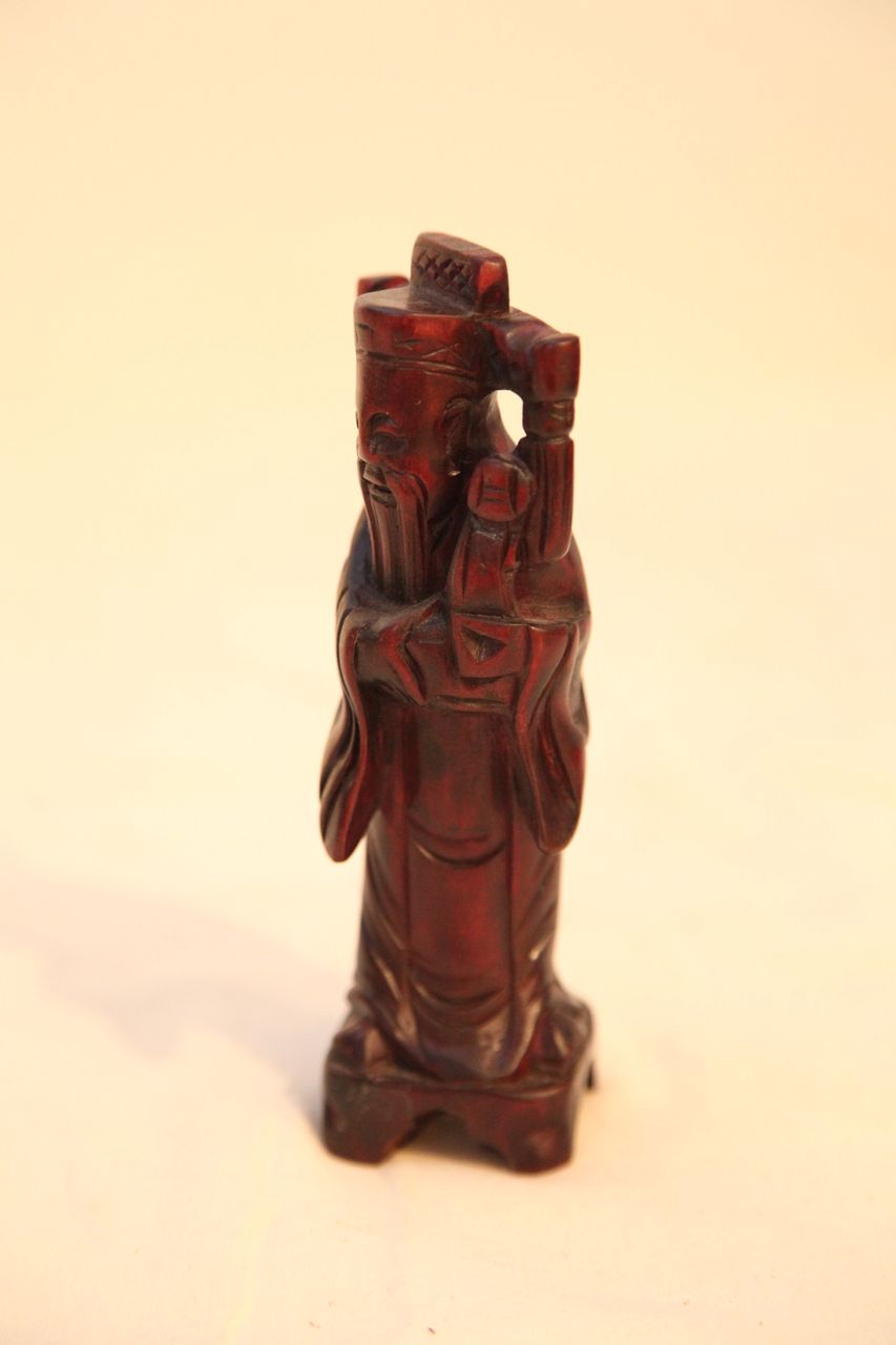 Vintage Chinese Wood Carving of Man Carrying a Ruyi Vintage Chinese Wood Carving of Man Carrying a Ruyi