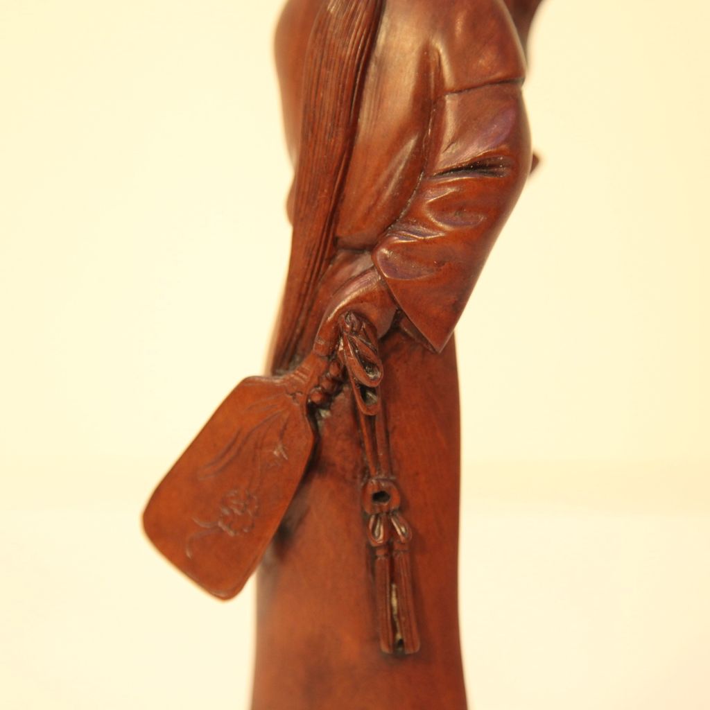 Vintage Wood Carving of Woman with a Fan Vintage Wood Carving of Woman with a Fan