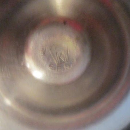Vintage Pair of silver Plated Candle Holders has 'K" within Logo on Bottom Vintage Pair of silver Plated Candle Holders has 'K" within Logo on Bottom