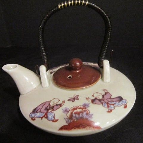 Vintage Japanese Tea Pot decorated with Children and Butterfly Vintage Japanese Tea Pot decorated with Children and Butterfly