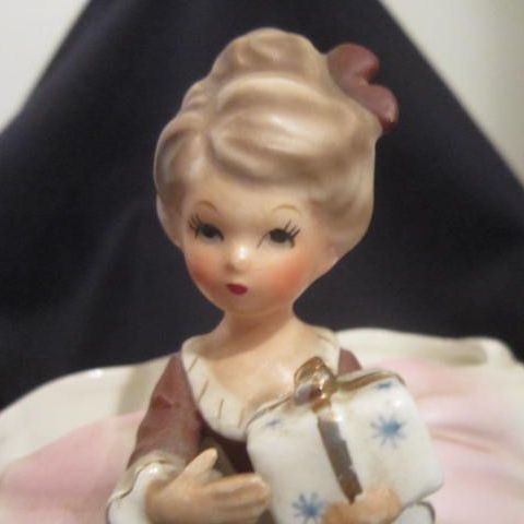 Vintage Girl with Package Planter Marked Inarco Vintage Girl with Package Planter Marked Inarco