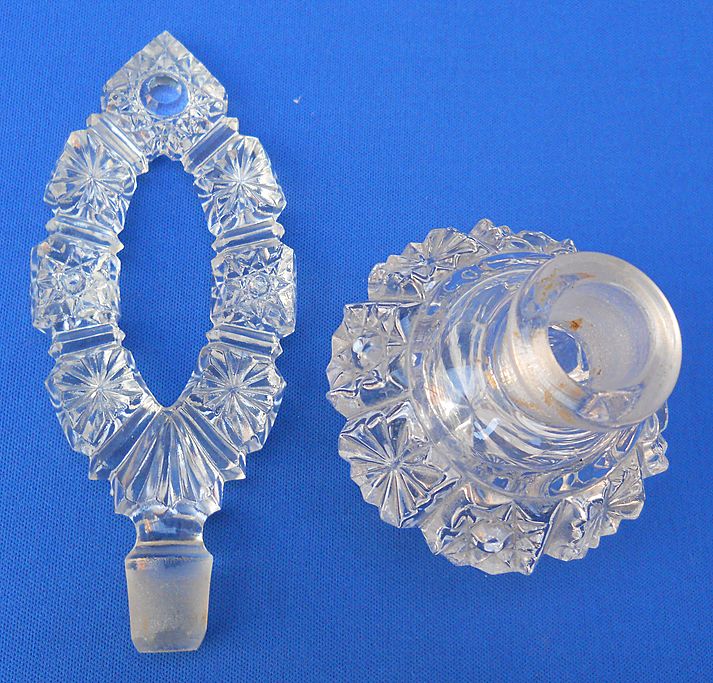 Czechoslovakian cut glass perfume with cut-out stopper, c. 1930's Czechoslovakian cut glass perfume with cut-out stopper, c. 1930's