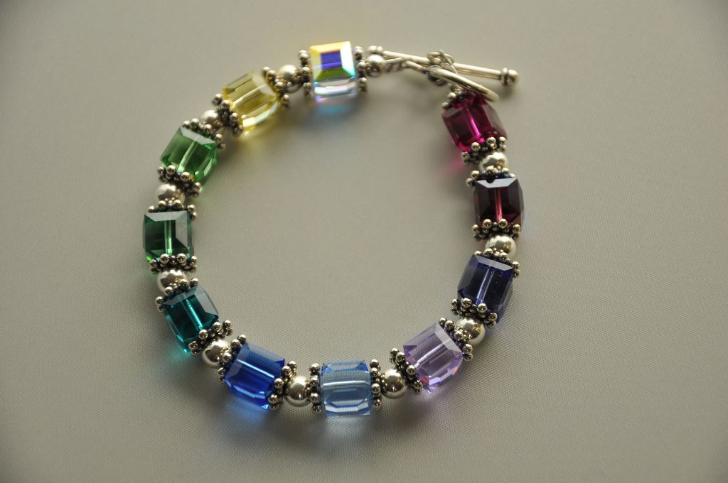 Swarovski Rainbow Cube and .925 Sterling Silver Bracelet. Swarovski Rainbow Cube and .925 Sterling Silver Bracelet.