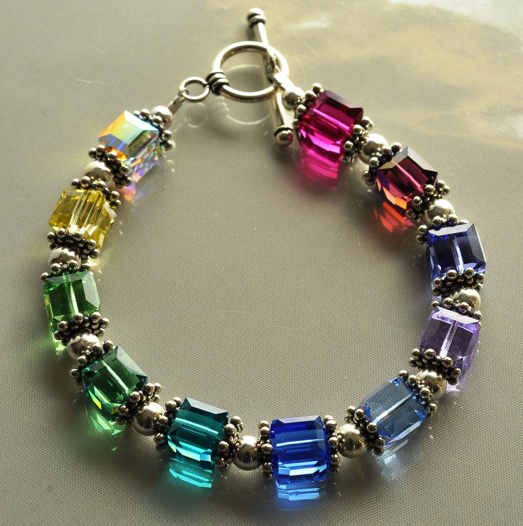 Swarovski Rainbow Cube and .925 Sterling Silver Bracelet. Swarovski Rainbow Cube and .925 Sterling Silver Bracelet.