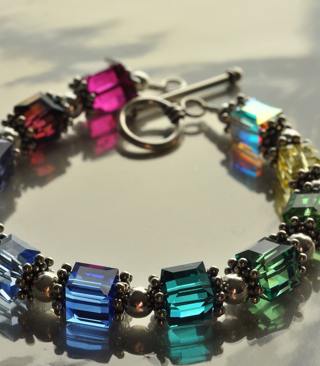 Swarovski Rainbow Cube and .925 Sterling Silver Bracelet. Swarovski Rainbow Cube and .925 Sterling Silver Bracelet.