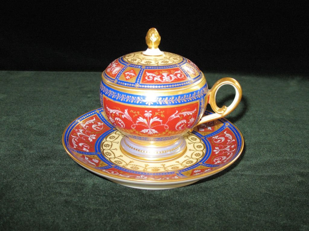 Gorgeous Royal Vienna lidded cup and saucer with gilding work (scroll and floral design) throughout Gorgeous Royal Vienna lidded cup and saucer with gilding work (scroll and floral design) throughout