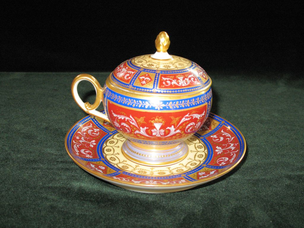 Gorgeous Royal Vienna lidded cup and saucer with gilding work (scroll and floral design) throughout Gorgeous Royal Vienna lidded cup and saucer with gilding work (scroll and floral design) throughout
