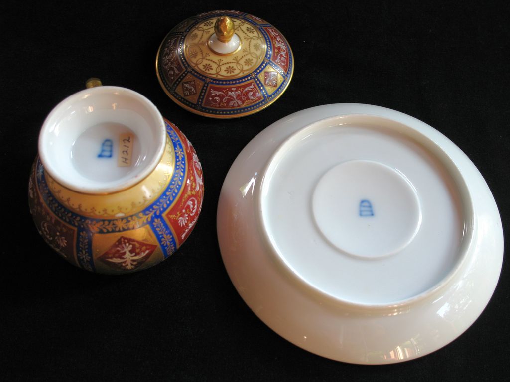 Gorgeous Royal Vienna lidded cup and saucer with gilding work (scroll and floral design) throughout Gorgeous Royal Vienna lidded cup and saucer with gilding work (scroll and floral design) throughout