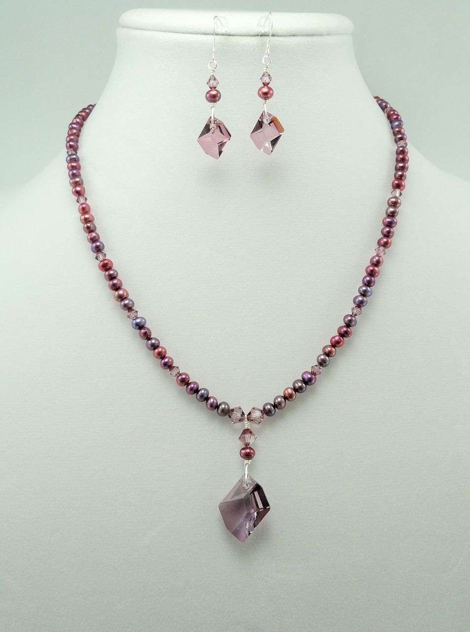 Swarovski Antique Pink Cosmic Crystal, cultured Freshwater Pearl, and Silver Necklace and Earring Set Swarovski Antique Pink Cosmic Crystal, cultured Freshwater Pearl, and Silver Necklace and Earring Set
