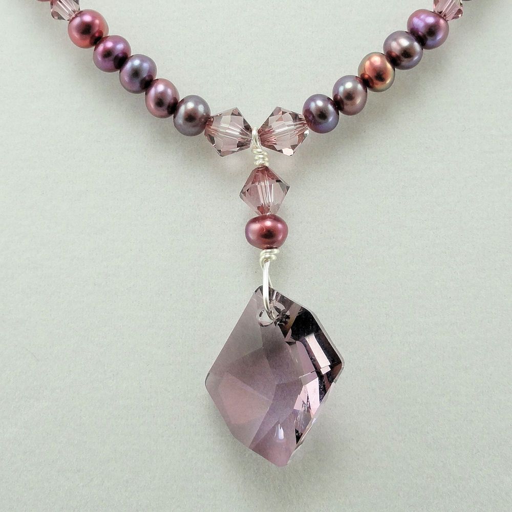 Swarovski Antique Pink Cosmic Crystal, cultured Freshwater Pearl, and Silver Necklace and Earring Set Swarovski Antique Pink Cosmic Crystal, cultured Freshwater Pearl, and Silver Necklace and Earring Set