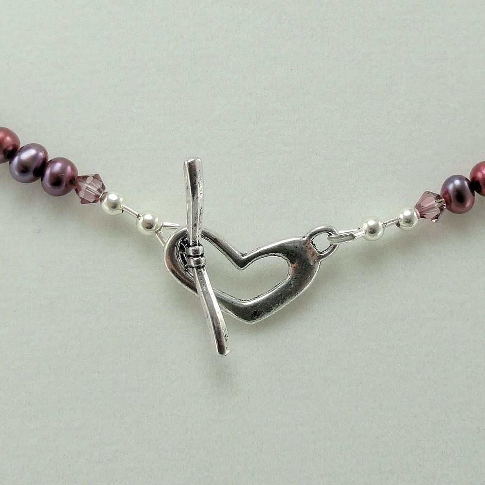 Swarovski Antique Pink Cosmic Crystal, cultured Freshwater Pearl, and Silver Necklace and Earring Set Swarovski Antique Pink Cosmic Crystal, cultured Freshwater Pearl, and Silver Necklace and Earring Set