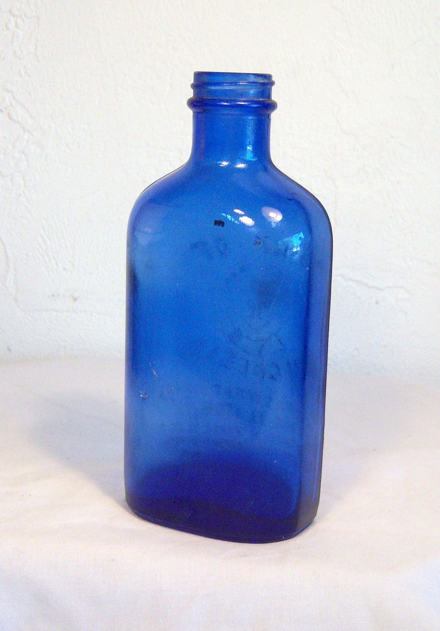 Milk of Magnesia Engraved Cobalt Blue Bottle Early 20th Century Milk of Magnesia Engraved Cobalt Blue Bottle Early 20th Century