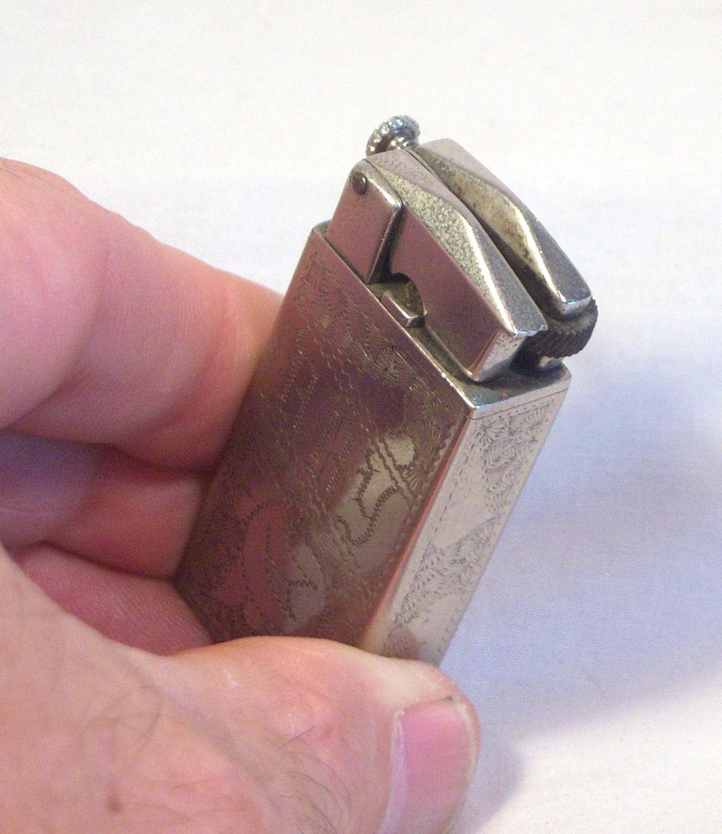 Ornate Silver Plated Lift-Arm Pocket Lighter 1920's Ornate Silver Plated Lift-Arm Pocket Lighter 1920's