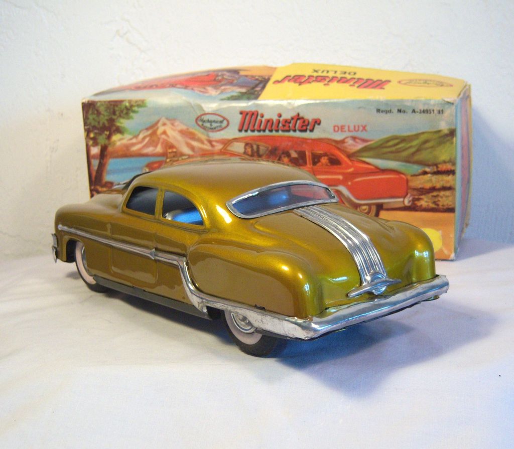 Vintage Minister Friction Drive Toy Tin Car in Gold Paint 1950's Vintage Minister Friction Drive Toy Tin Car in Gold Paint 1950's