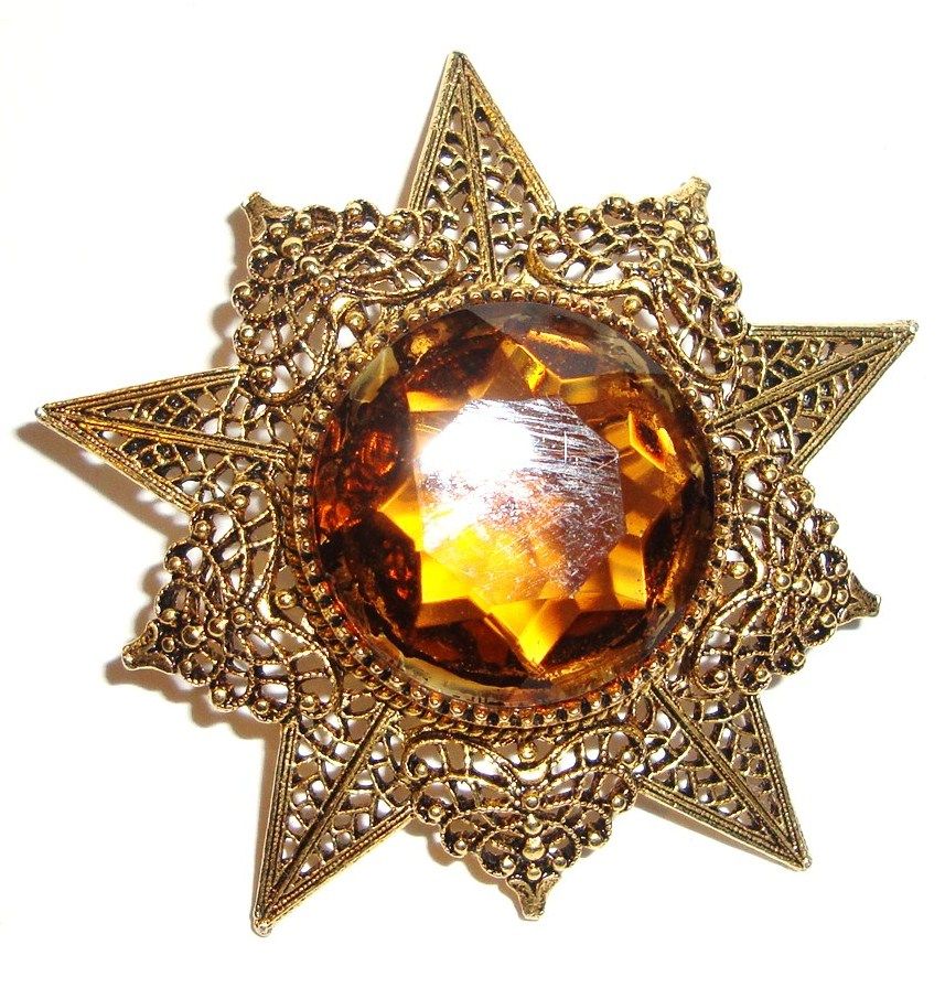 ART Goldtone Starburst Pin with Amber Rhinestone Center ART Goldtone Starburst Pin with Amber Rhinestone Center