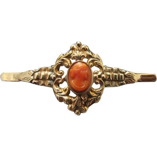 Antique Coral Cameo and fourteen karat yellow gold brooch Antique Coral Cameo and fourteen karat yellow gold brooch