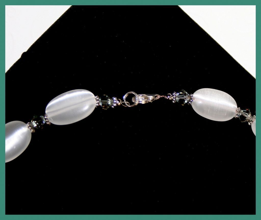 Necklace & Earrings, White Optic Oval Beads, Swarovski Crystals, and Sterling Clasp Necklace & Earrings, White Optic Oval Beads, Swarovski Crystals, and Sterling Clasp